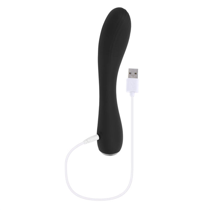 Midnight Magic Textured Rechargeable G-Spot Vibrator in black from Selopa, Out of box side view of  charging cable in port.