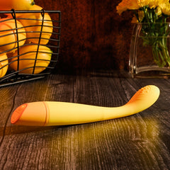 Lemon Squeeze Rechargeable Slim G-Spot Vibrator in yellow from Selopa, out of box side view of button control. 