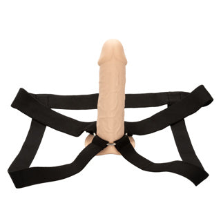 Hollow dong displayed with harness