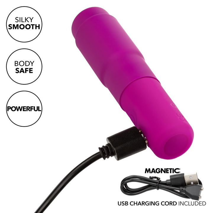 Kyst Mega-Mite Rocket Style Clitoral Vibrator in Pink Charging 