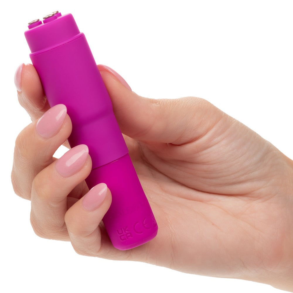 Kyst Mega-Mite Rocket Style Clitoral Vibrator in Pink in Hand