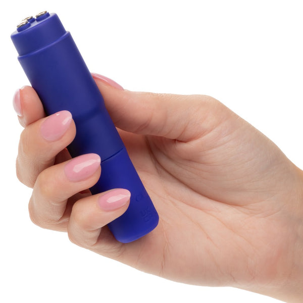 Kyst Mega-Mite Rocket Style Clitoral Vibrator in Blue in Hand