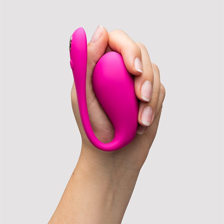 We-Vibe Jive2 App-Controlled Wearable G-Spot Vibe out of box view of product held in a hand. 