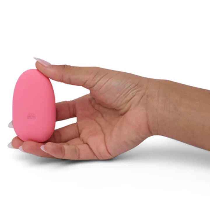 pebble being held upright