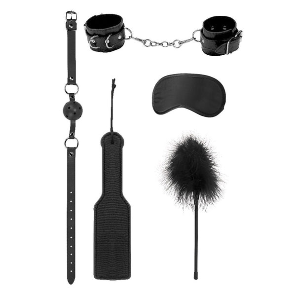 Picture of included gag, cuffs, paddle, mask, and tickler with the Ouch intro bondage kit