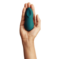 We-Vibe Touch X Magic Multitasker Vibe in velvet green - compact size in palm of hand